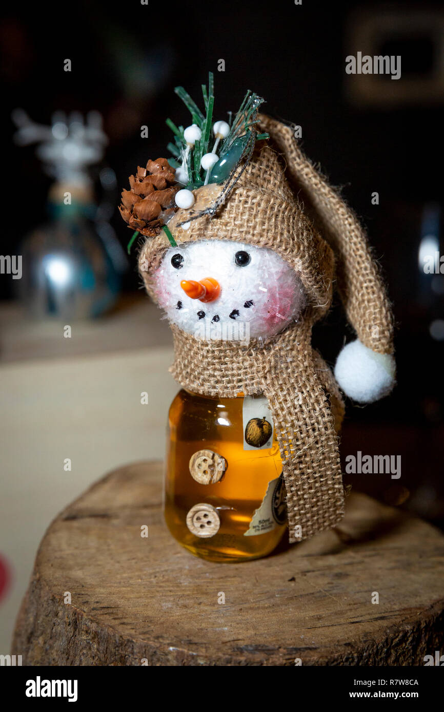 Miniature bottle of Hard Cider - as a handmade Christmas ornament for a Holiday Party Stock Photo