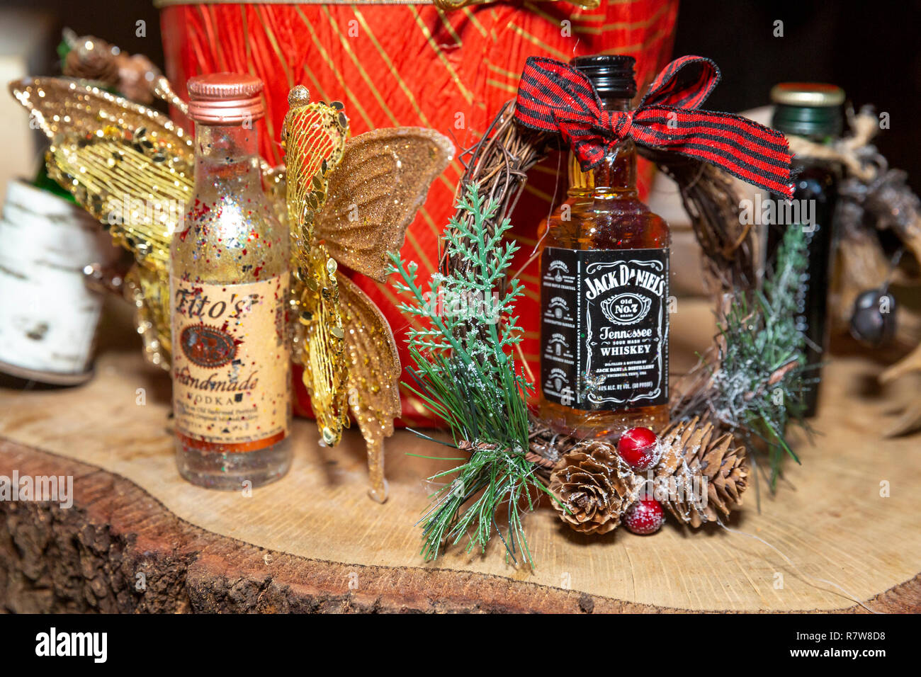 Christmas holiday concept, Jack Daniel bottle christmas tree creative, gold  shiny snowflake decoration on brown background Stock Photo - Alamy