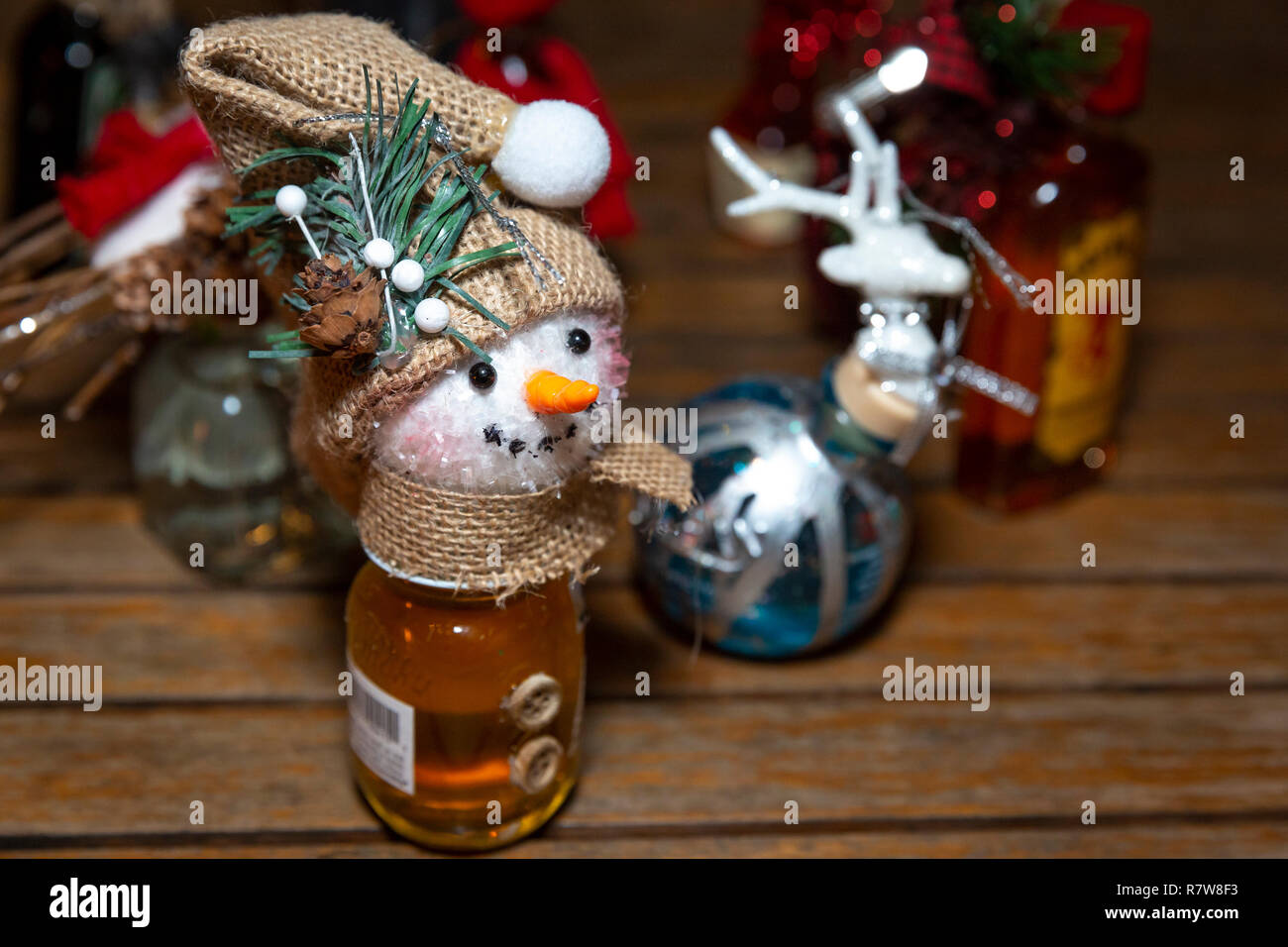 Miniature bottle of Hard Cider - as a handmade Christmas ornament for a Holiday Party Stock Photo