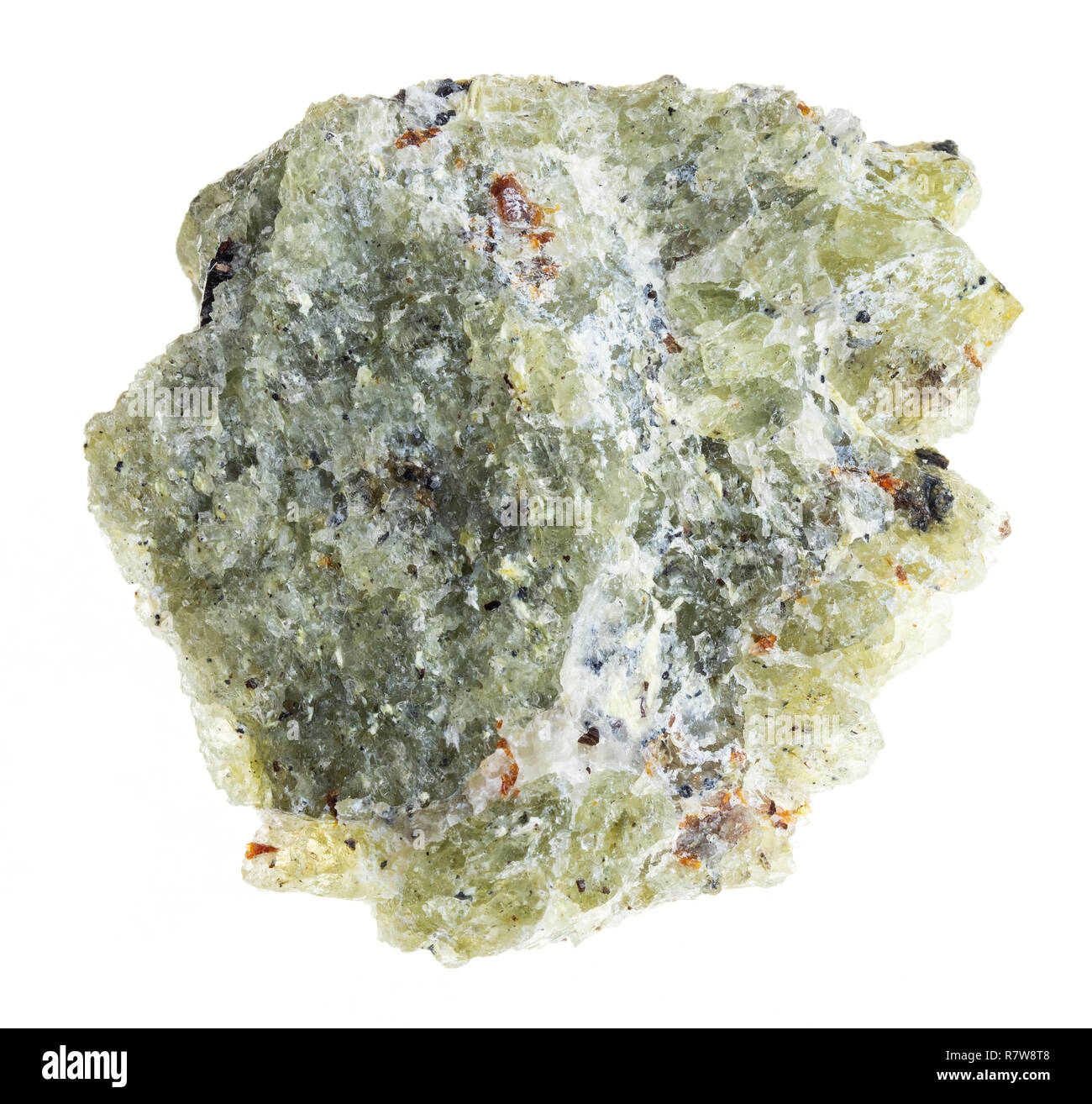 macro photography of natural mineral from geological collection - rough olivine ( chrysolite) stone on white background Stock Photo