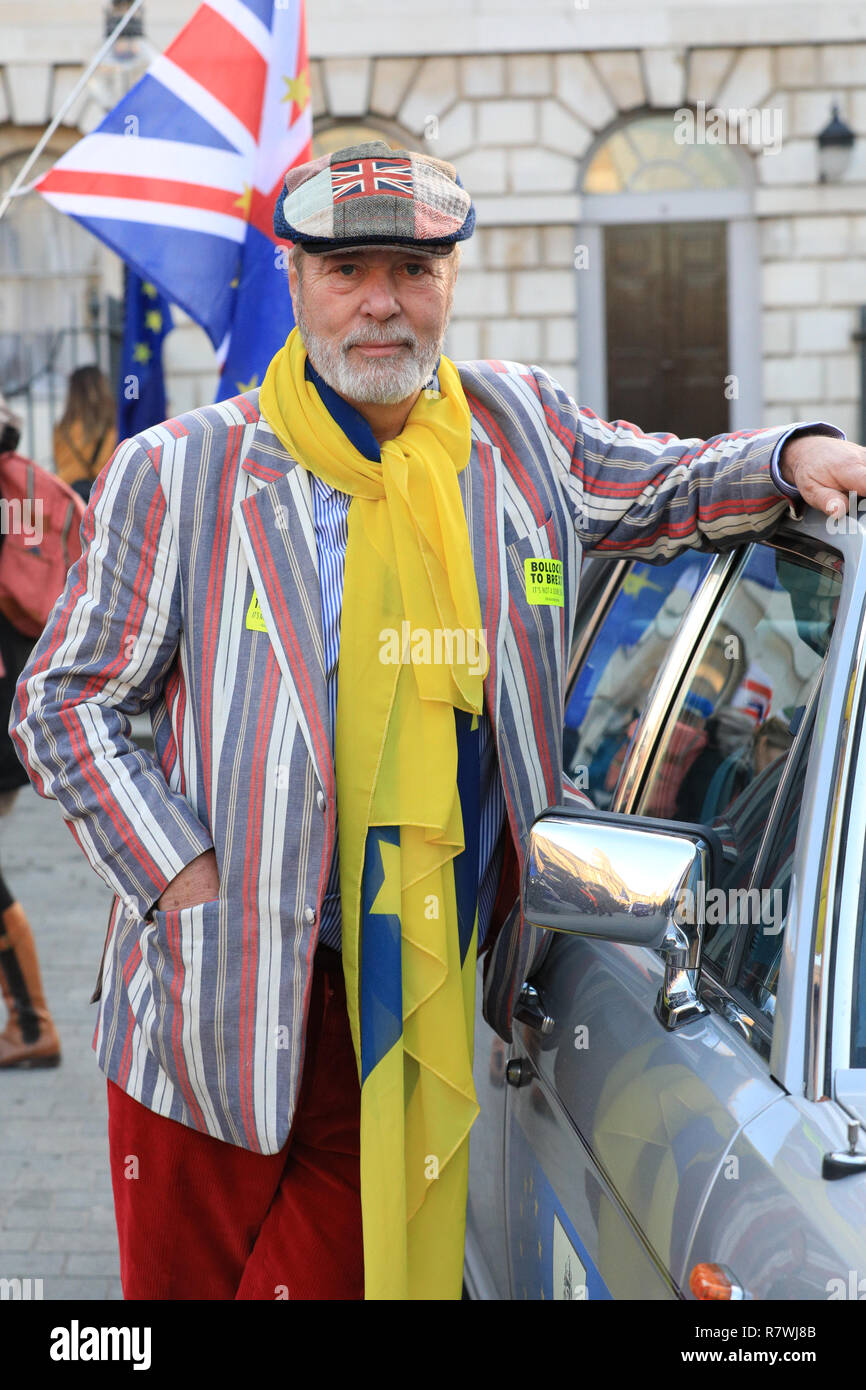 Westminster, London, 11th Dec 2018. Paddy Heyland, Director of soap maker Heyland and Whittle, has brought flags and his Rolls Royce to support the Anti-Brexit protest. Pro- and Anti-Brexit protesters both rally in Westminster near the Houses of Parliament. Credit: Imageplotter News and Sports/Alamy Live News Stock Photo