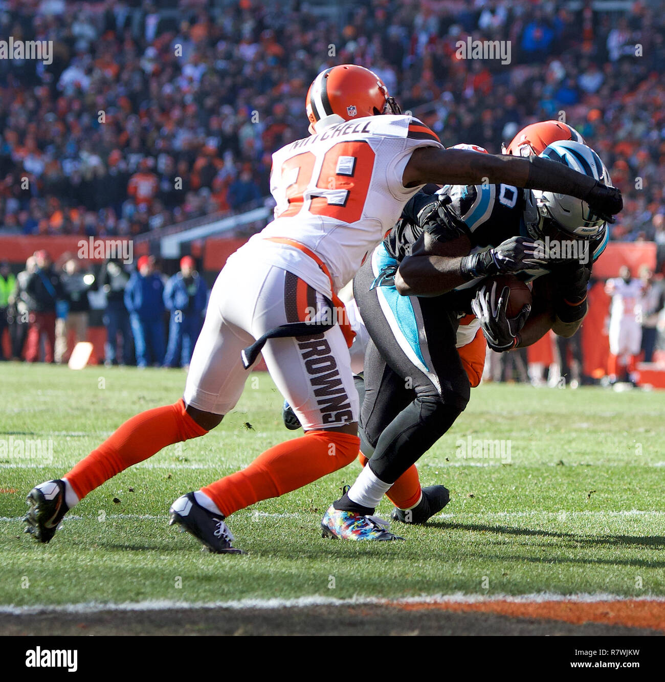 Cleveland, Ohio, USA. 9th Dec, 2018. Carolina Panthers tight end Ian Thomas  (80) tackled short of the goal line by Cleveland Browns cornerback Terrance  Mitchell (39) at the NFL football game between
