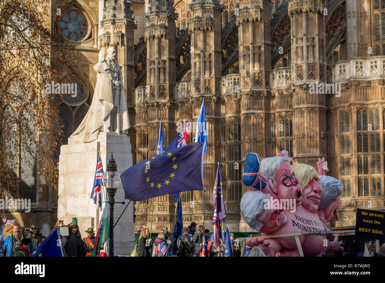 London, UK 11th December 2018: As Prime Minister Theresa May tours European capitals hoping to persuade foreign leaders to accept a new Brexit deal (following her cancellation of a Parliamentary vote), pro-EU Remainers protest beneath the statue of King George V beneath Westminster Abbey and opposite the Houses of Parliament, on 11th December 2018, in London, England. Photo by Richard Baker / Alamy Live News Stock Photo