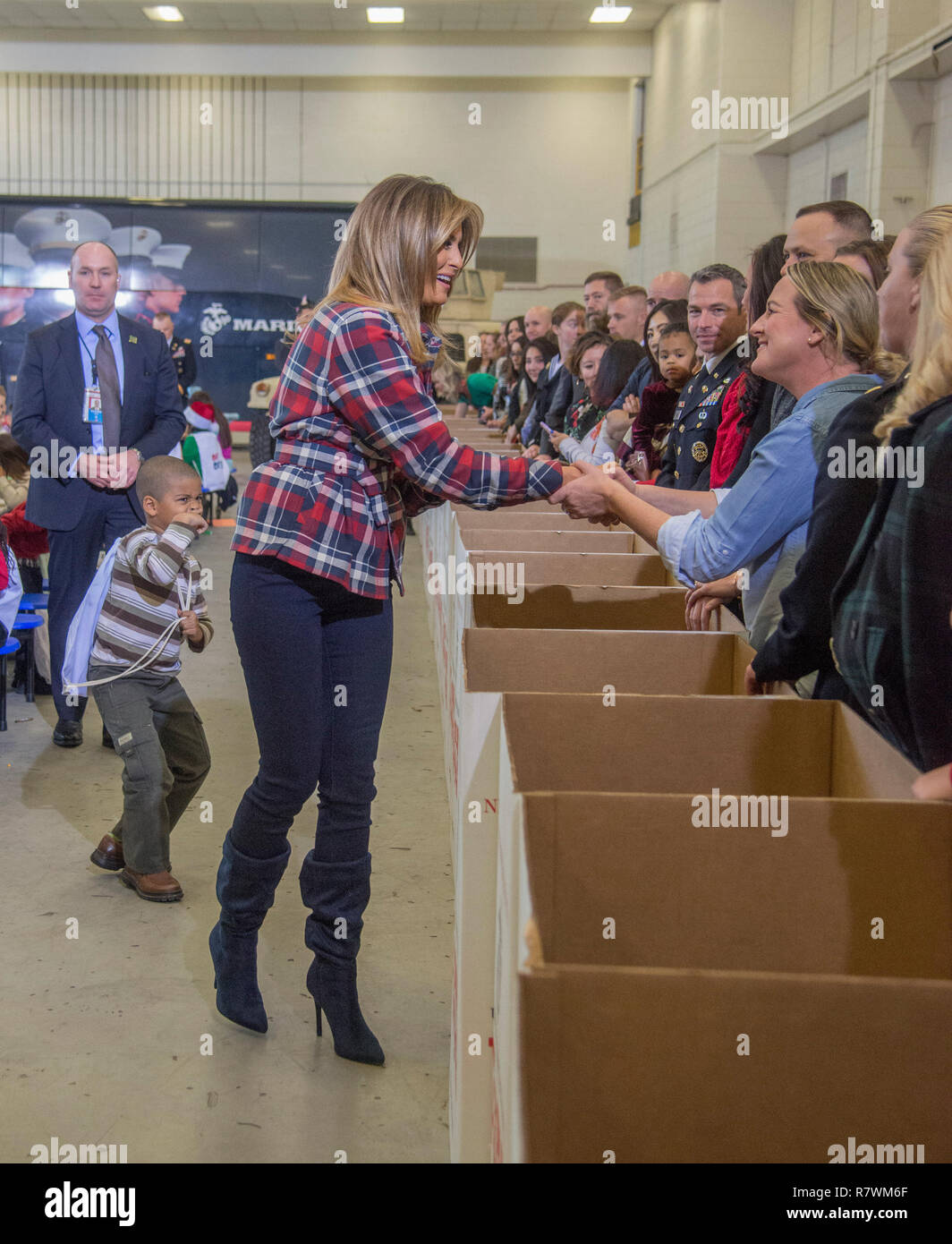 Washington, DC December 11 ,2018:  First Lady Melania Trump participates in the annual Toys for Tots program at Joint Base Andrews in Washington DC.  The First Lady was assisted in her efforts by children of Military personnel and later by Santa Claus. She also took time to greet the spouses of the members of the military stationed at Joint Base Andrews.  Credit: Patsy Lynch/Alamy Live News Stock Photo