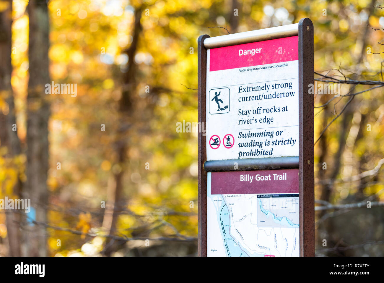 Great Falls, USA - October 31, 2018: Trees during autumn in Maryland, colorful yellow orange leaves foliage and sign directions map for famous Billy G Stock Photo