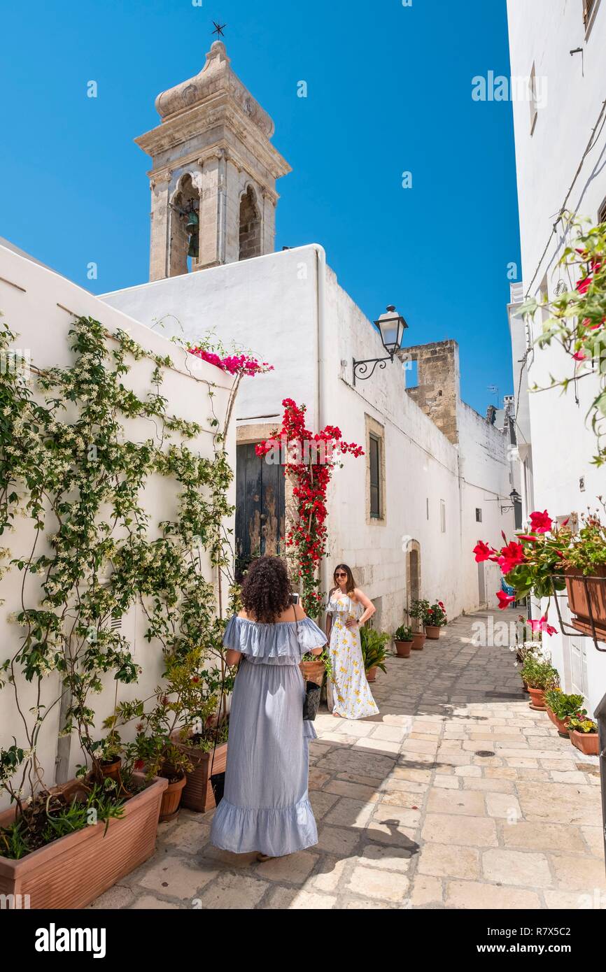 Italy, Apulia, Polignano a Mare, the historic centre is perched on a limestone cliff overlooking the Adriatic Sea Stock Photo