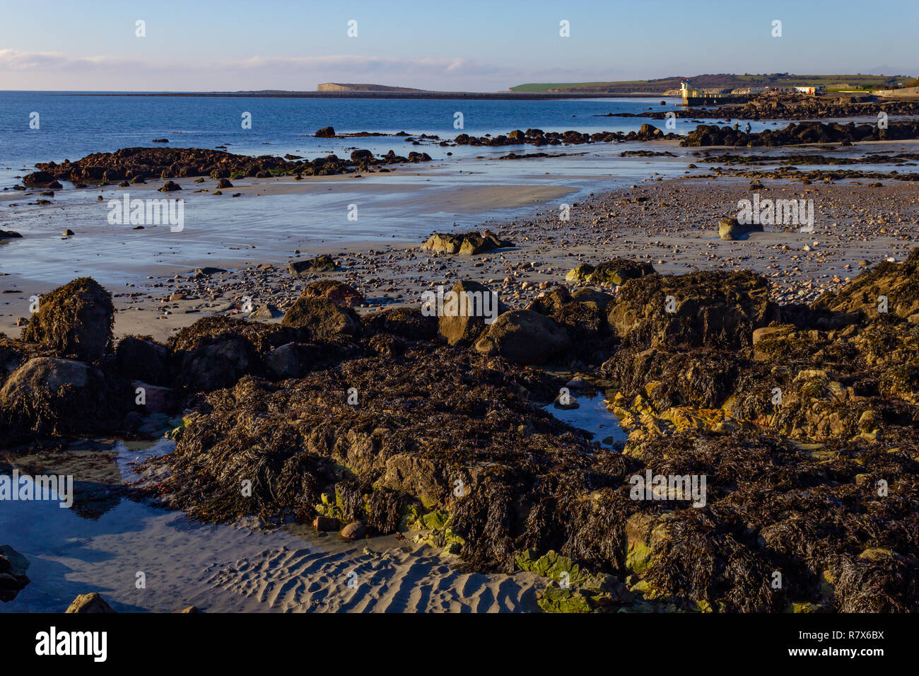 Rocks and sand at Black Rock, Salt hill beach, Galway, Ireland Stock ...