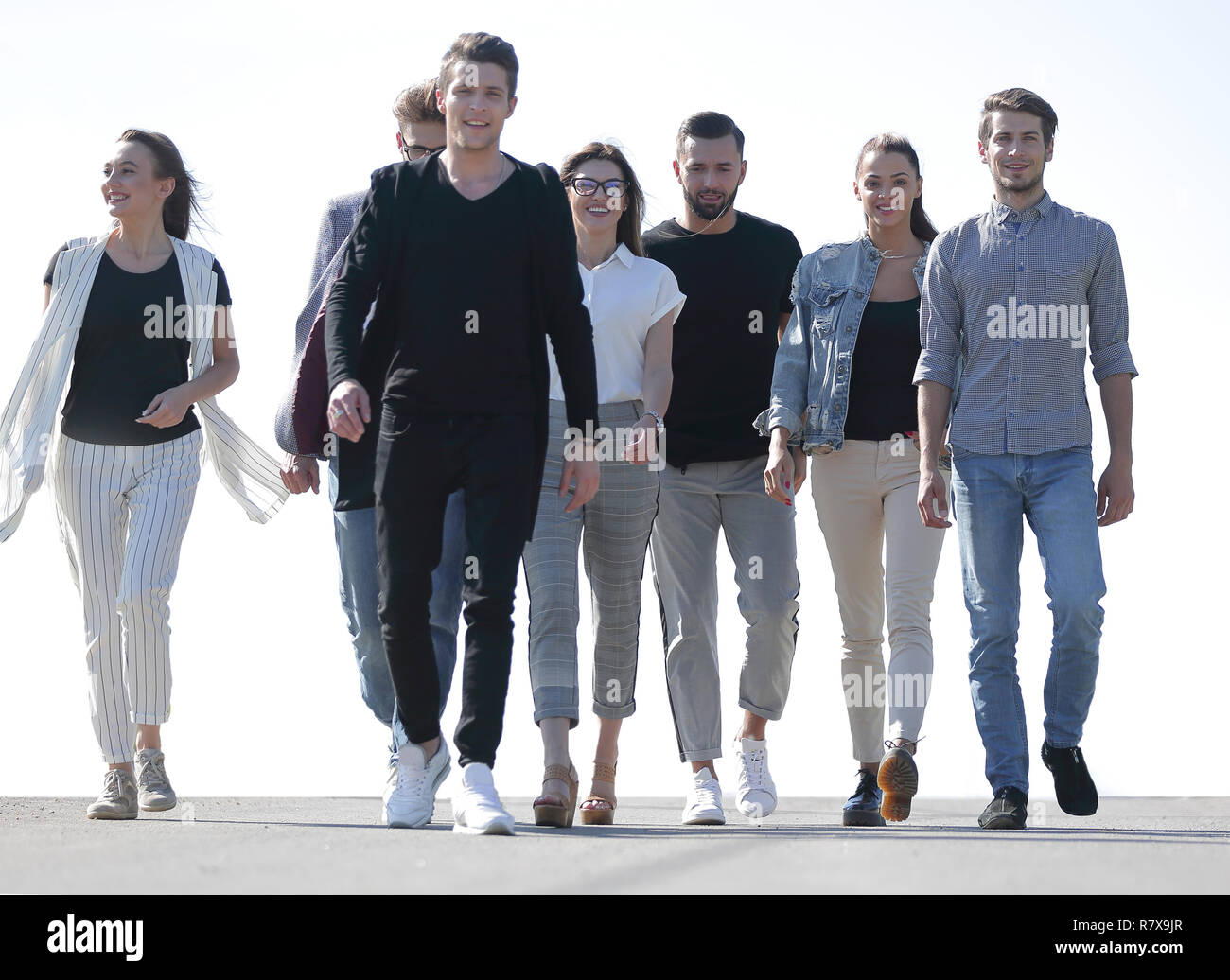Young friends walking on crowded hi-res stock photography and images ...