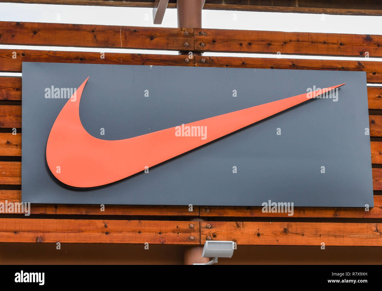 SEATTLE, WA, USA - JUNE 2018: Close up view of a sign outside the Nike factory store at the Premium Outlets shopping mall in Tulalip near Seattle. Stock Photo