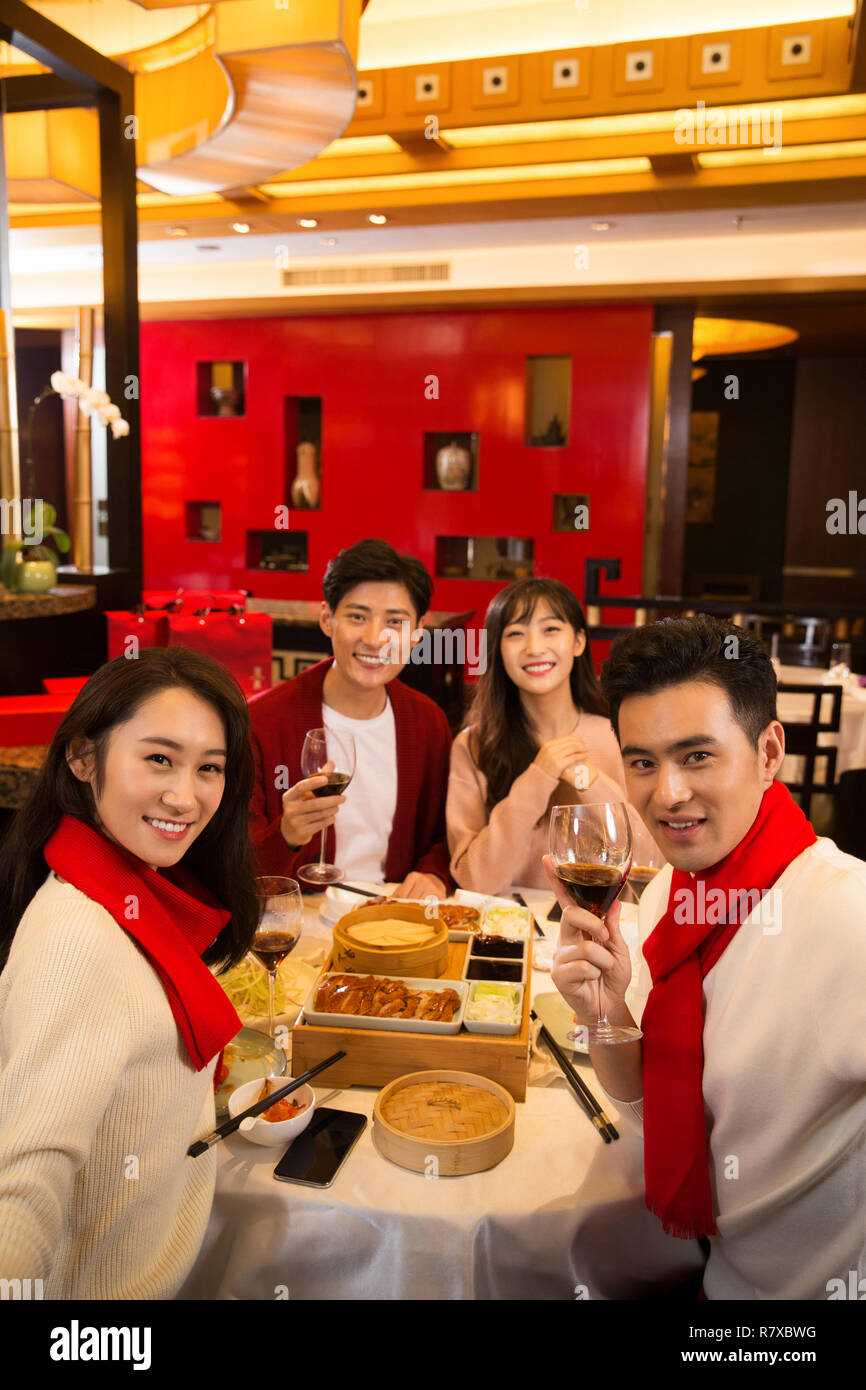Young people in the restaurant for dinner Stock Photo