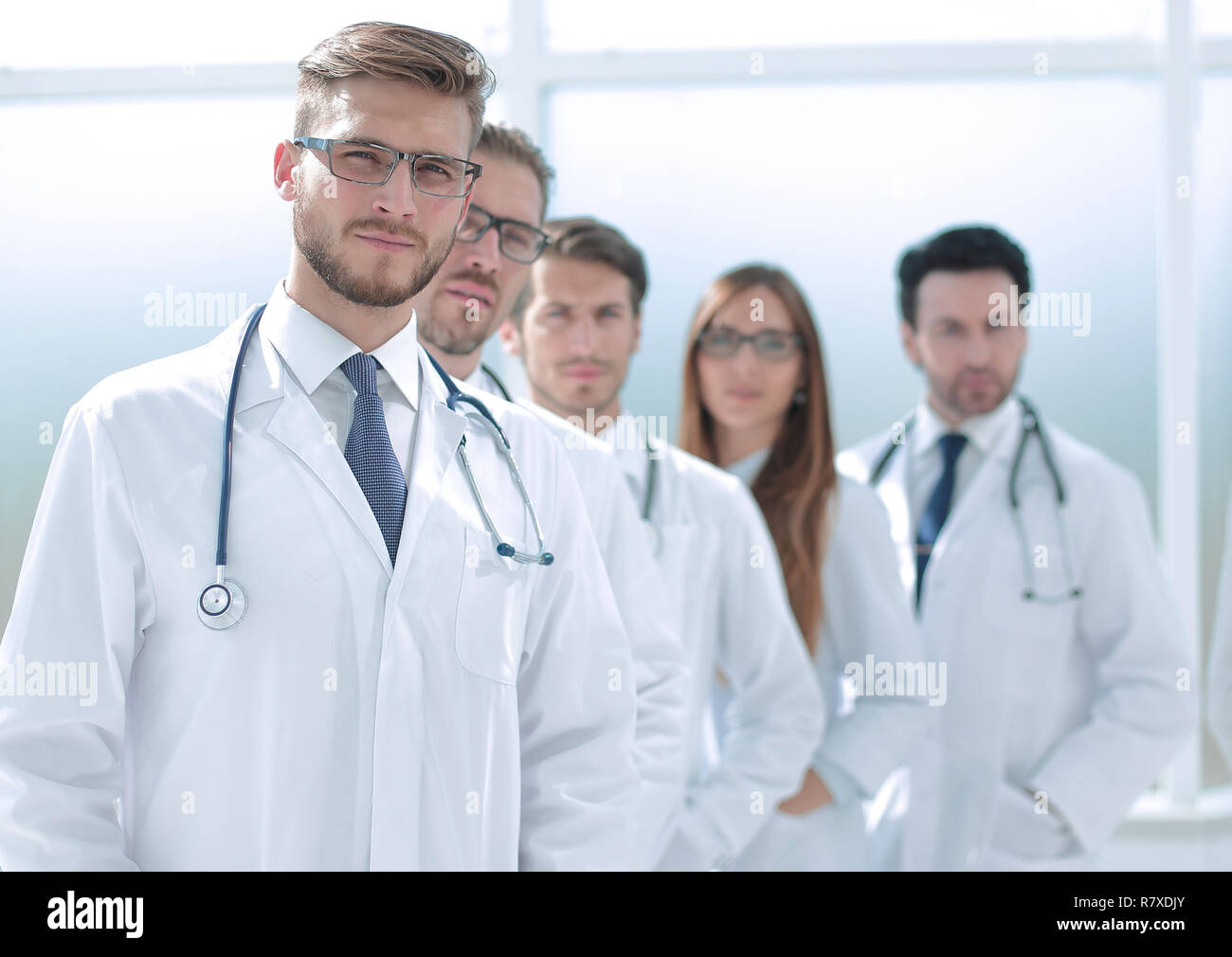 team of doctors standing in the hospital corridor Stock Photo - Alamy