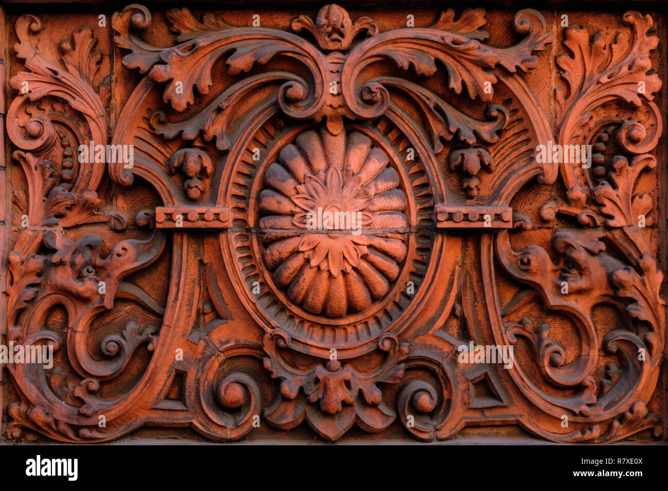 Decorative Facing Stone Carving. Ornate Building Stone. Buliding Design. Building Facade. Welsh Terracotta Stock Photo