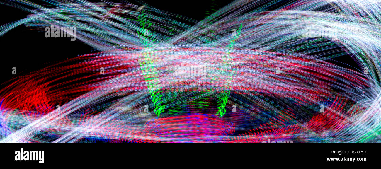 Long Exposure Of A Spinning Carnival Ride Stock Photo - Alamy
