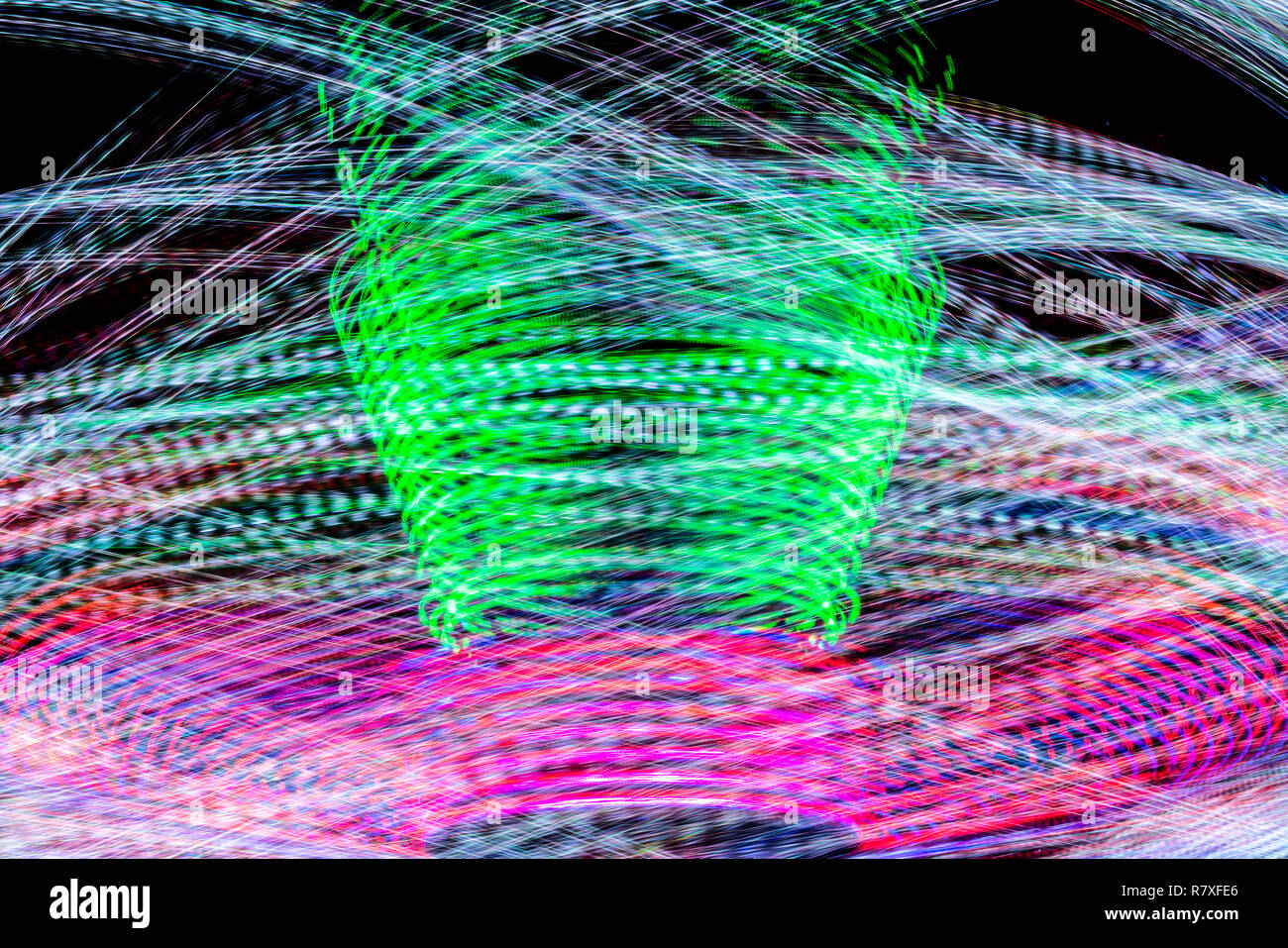 Long Exposure Of A Spinning Carnival Ride Stock Photo - Alamy