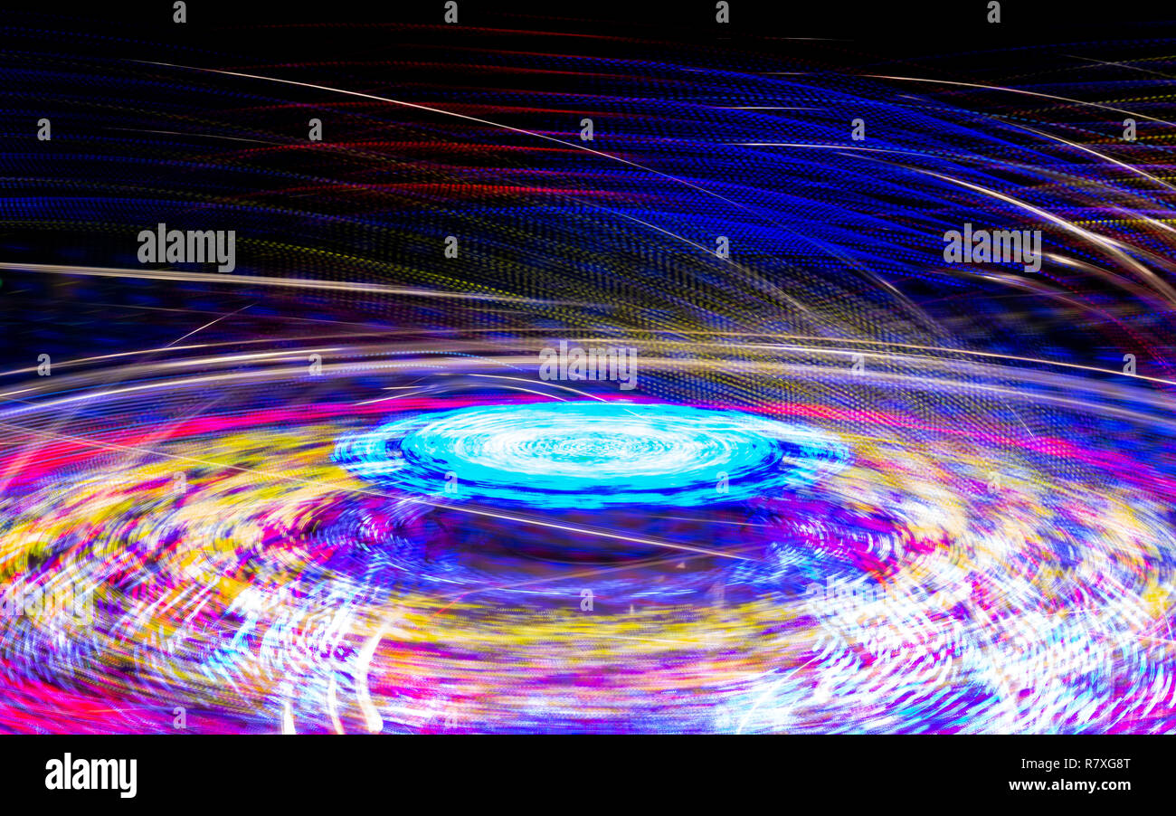 Long Exposure Of A Spinning Carnival Ride Stock Photo - Alamy