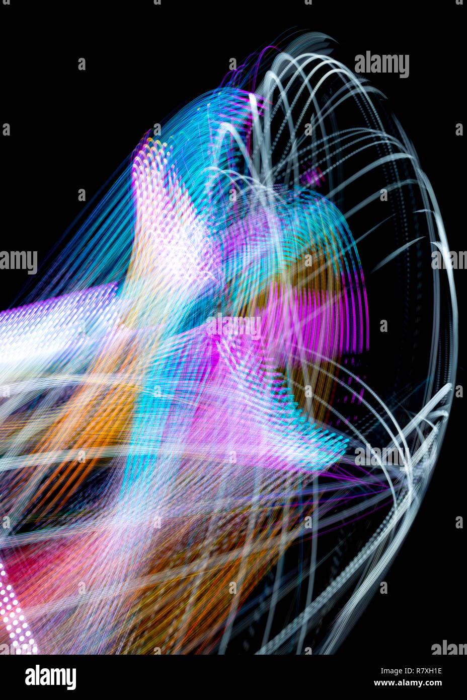Long Exposure Of A Spinning Carnival Ride Stock Photo - Alamy