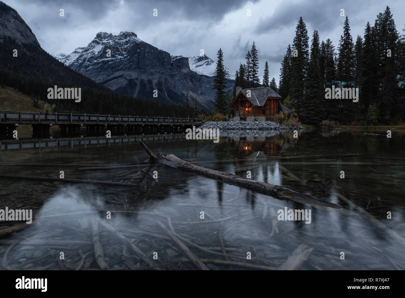 Beautiful View Of A Cabin Near A Glacier Lake With Canadian Rocky