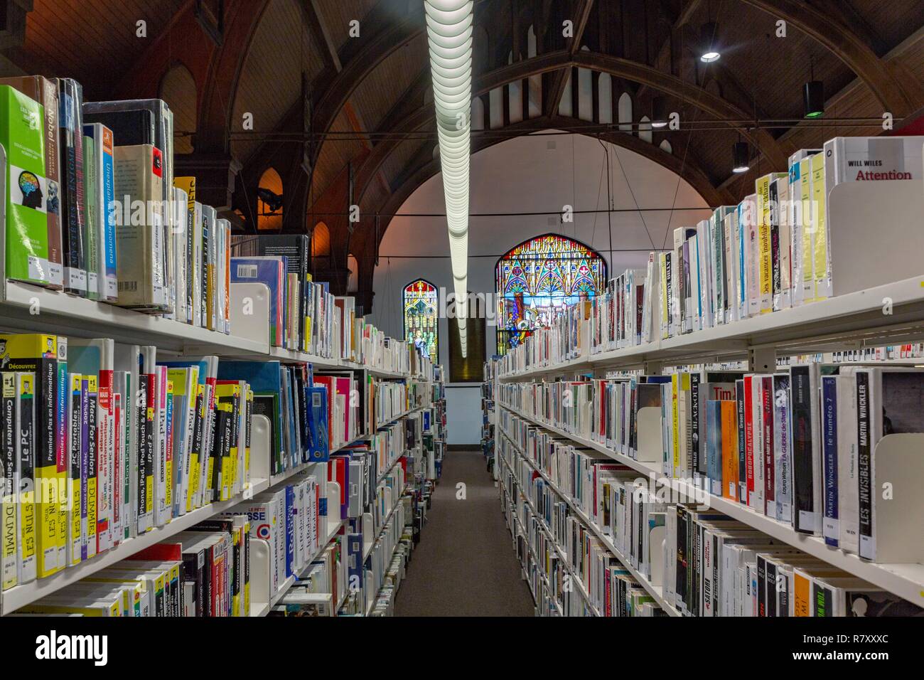 Canada, Quebec province, Montreal, Religious Heritage, Mordecai-Richler Library named after the famous writer installed in the old church Church of the Ascension Stock Photo