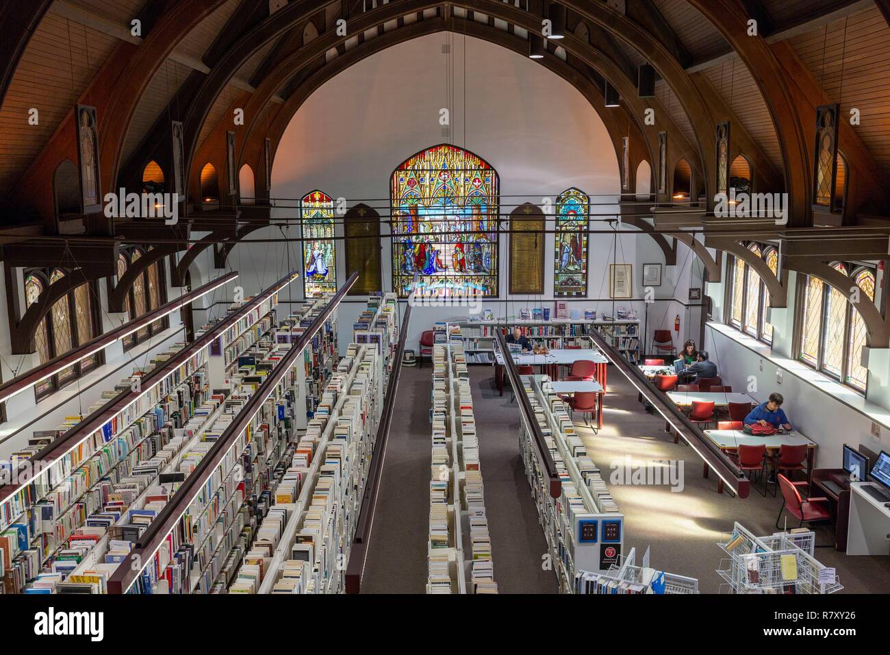 Canada, Quebec province, Montreal, Religious Heritage, Mordecai-Richler Library named after the famous writer installed in the old church Church of the Ascension Stock Photo
