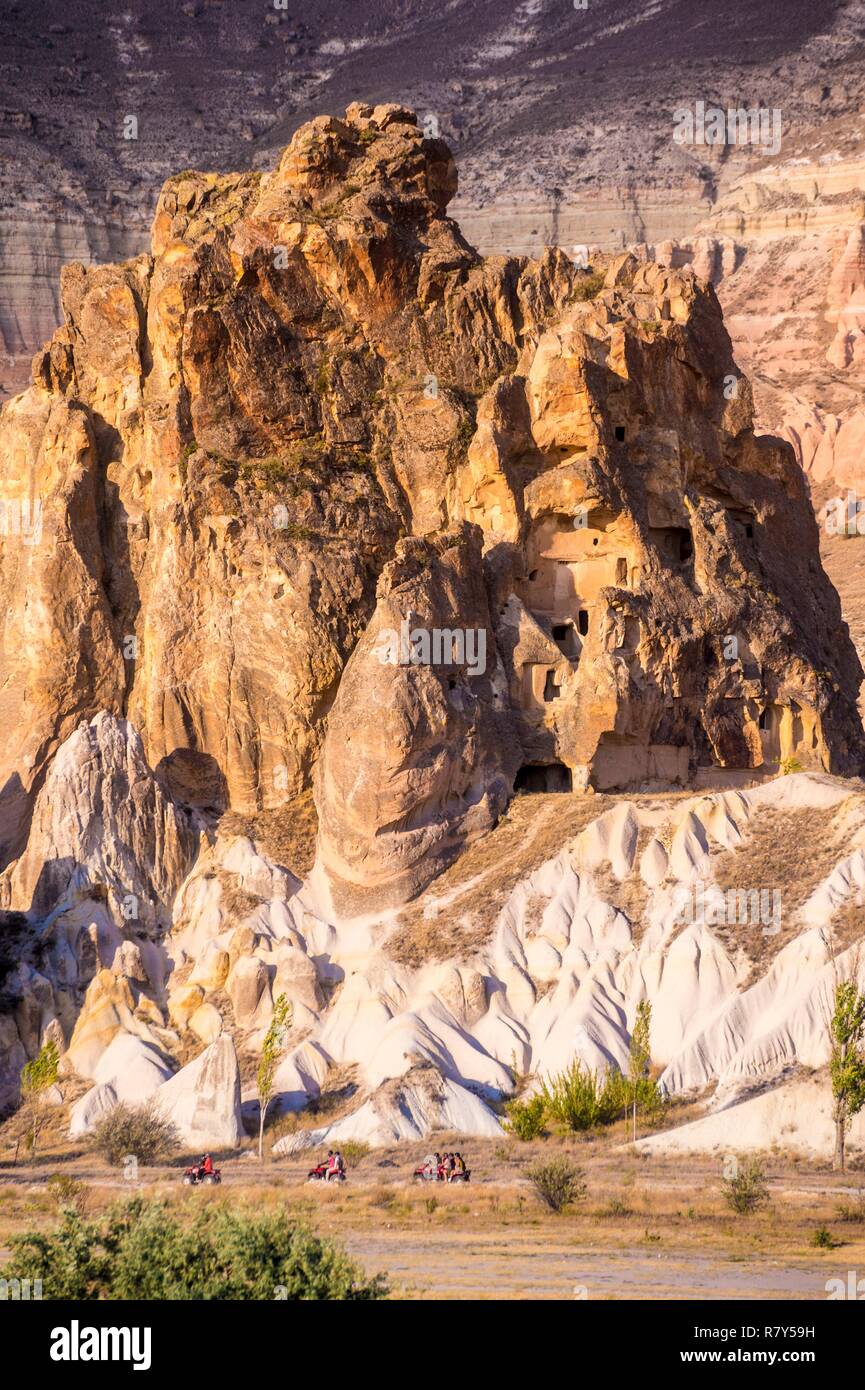 Turkey, Central Anatolia, Nev&#x15f;ehir province, Cappadocia UNESCO World Heritage Site, Göreme, quad bike ride to discover the emblematic landscapes of the volcanic tuff hills and vestiges of troglodyte dwellings in the Göreme National Park Stock Photo
