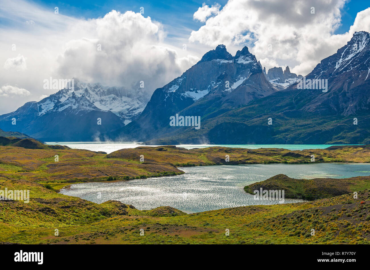 The colorful Nordenskjold Lake during summer in windy Patagonia with a dramatic sky, Torres del Paine national park, Puerto Natales, Chile. Stock Photo