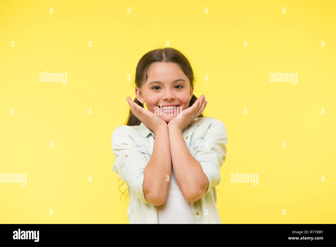 Touch baby cheek hi-res stock photography and images - Alamy