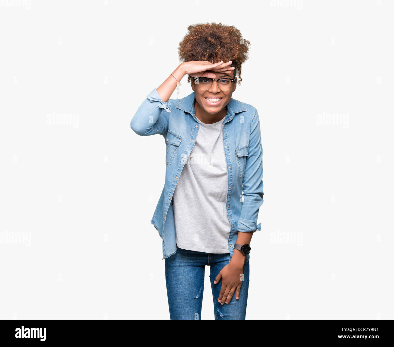 Beautiful young african american woman wearing glasses over isolated ...