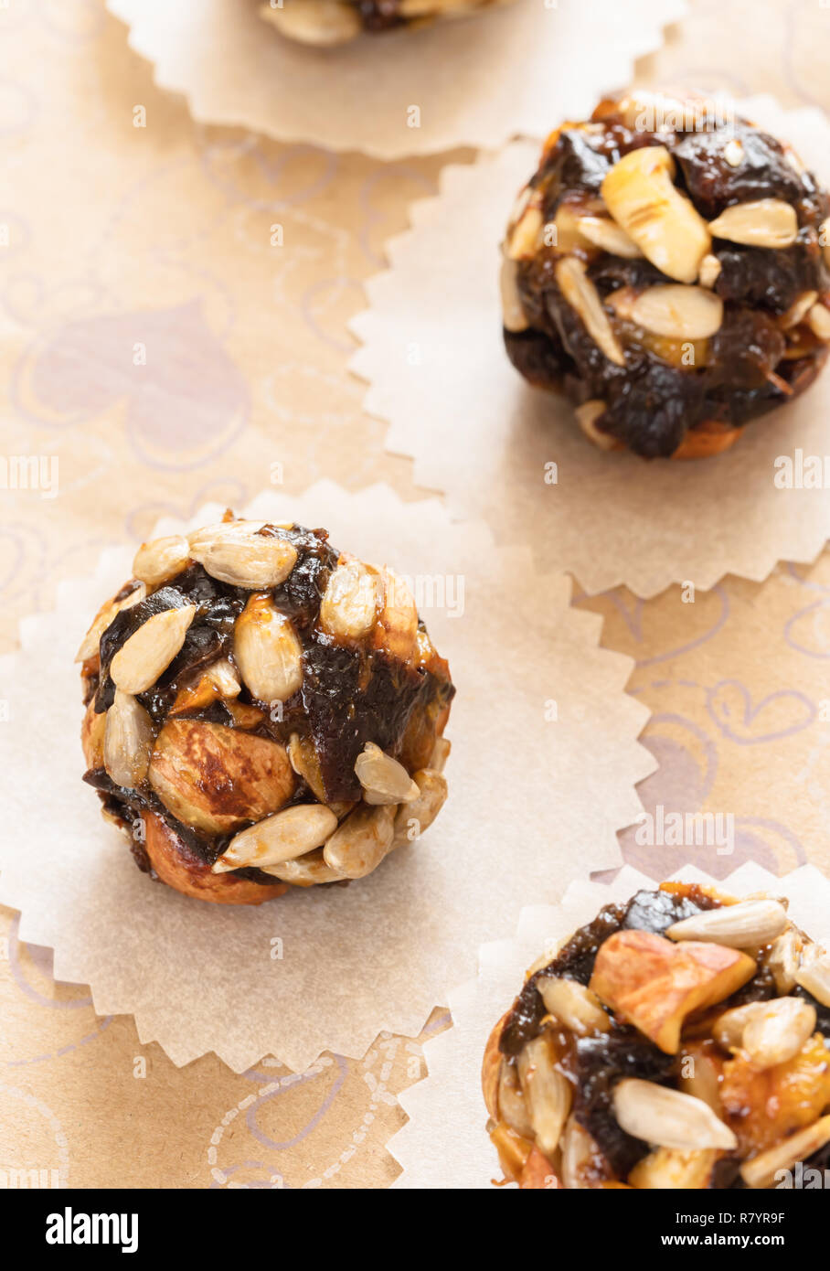 Top view organic energy balls handmade on wrapping paper. Stock Photo
