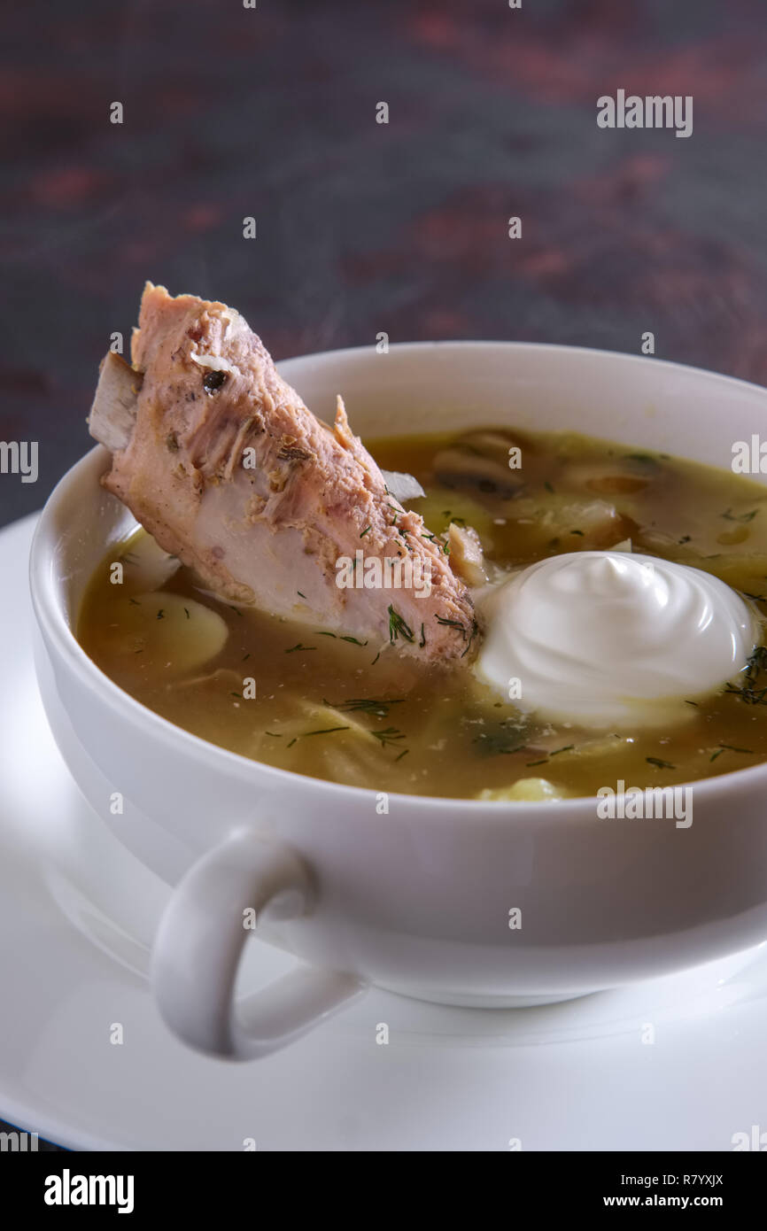 Beef bouillon with meat on a bone Stock Photo Alamy