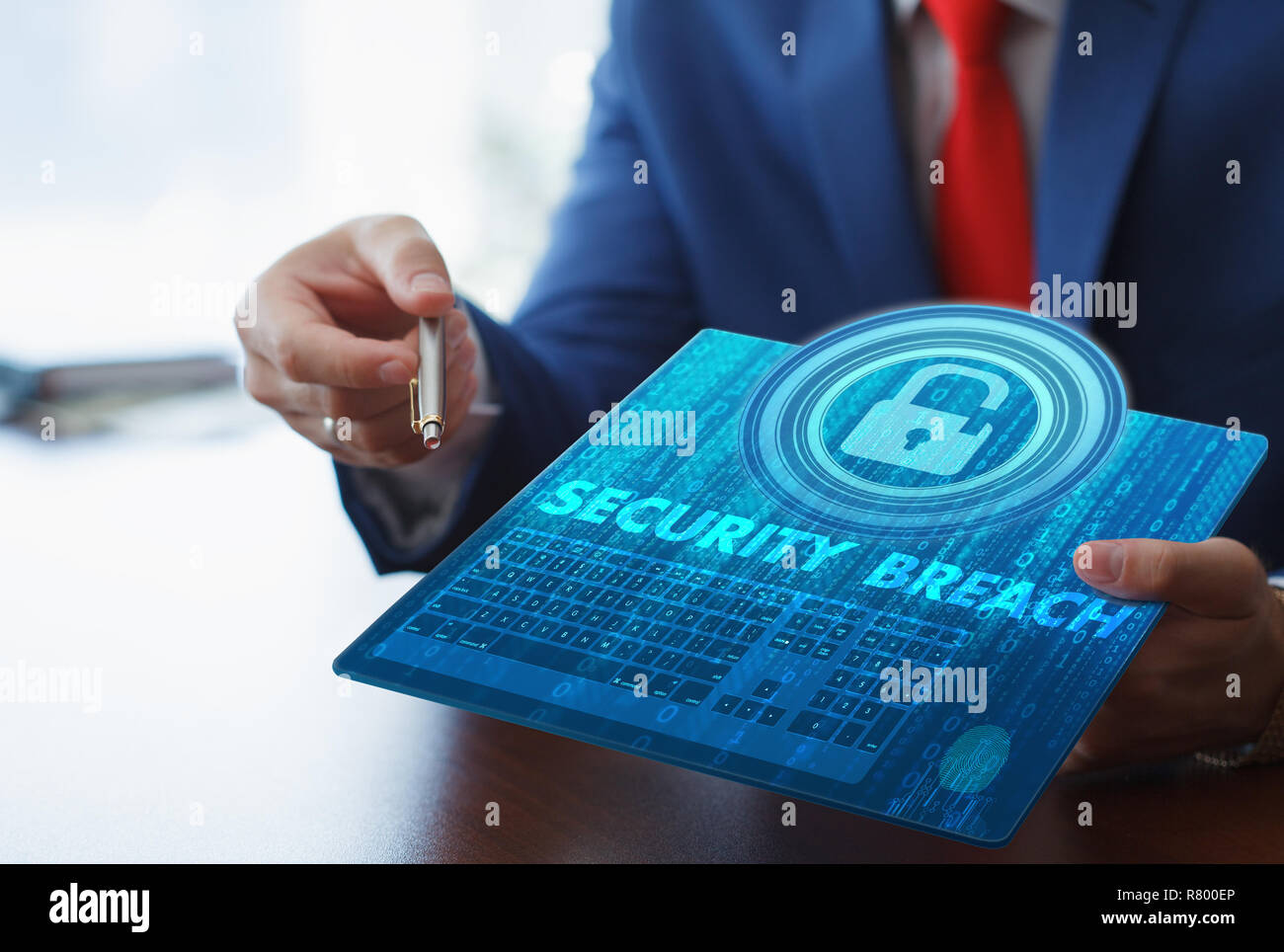 Business, Technology, Internet and network concept. Young businesswoman working on her tablet in the office of the future, select Security breach on t Stock Photo