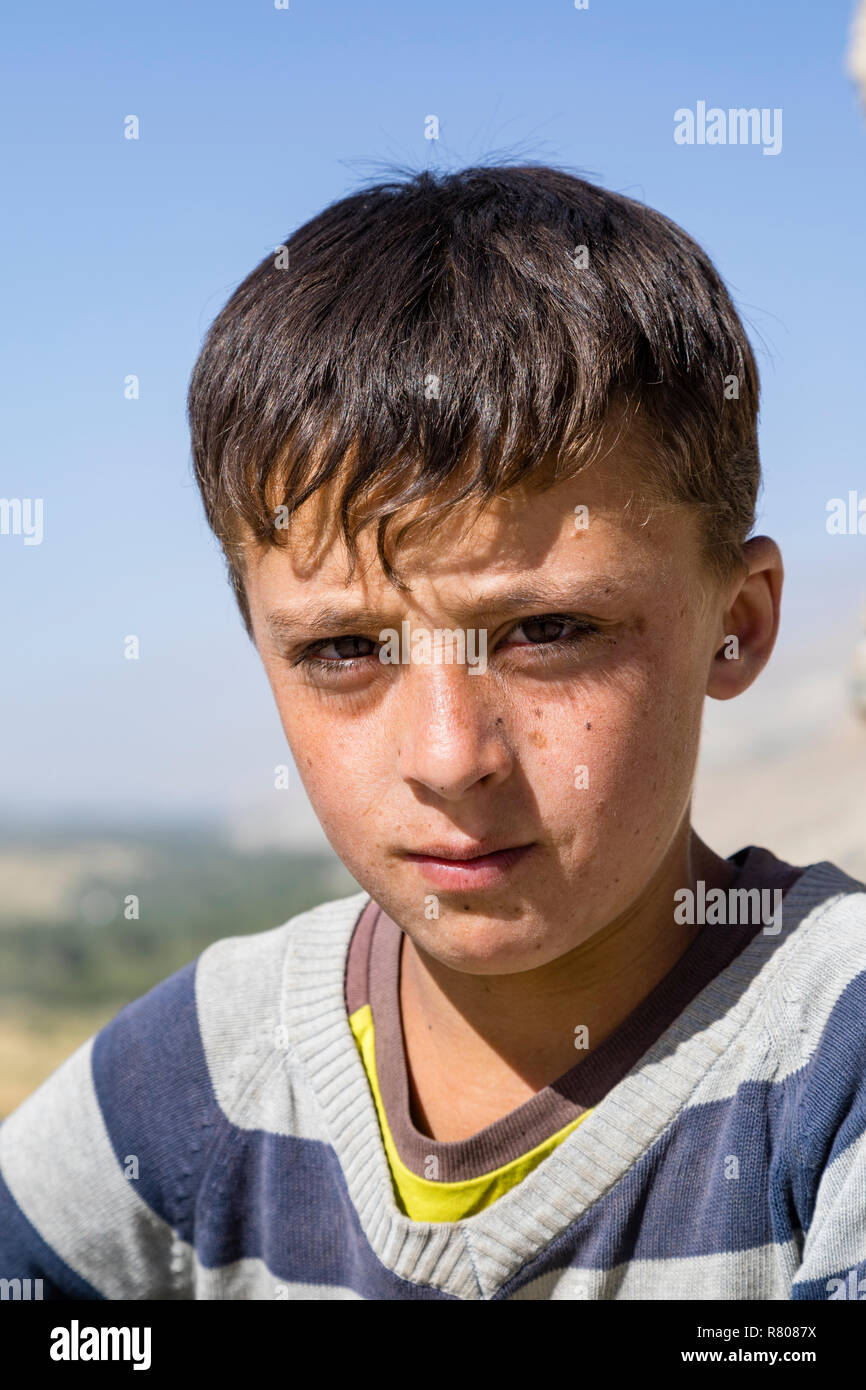 Vrang, Tajikistan August 24 2018: Portrait of a boy in Vrang in the Wakhan valley in Tajikistan Stock Photo