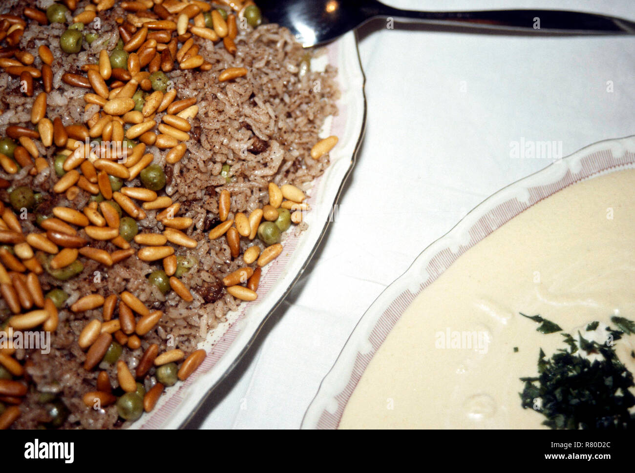Oriental rice with pine nuts and laban dip from Jordan Stock Photo - Alamy