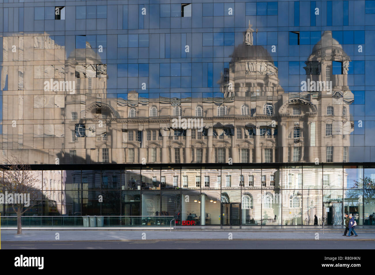 Mersey Docks and Harbour Board Building, reflecting in Mann Island Building, Liverpool. Image taken in November 2018. Stock Photo