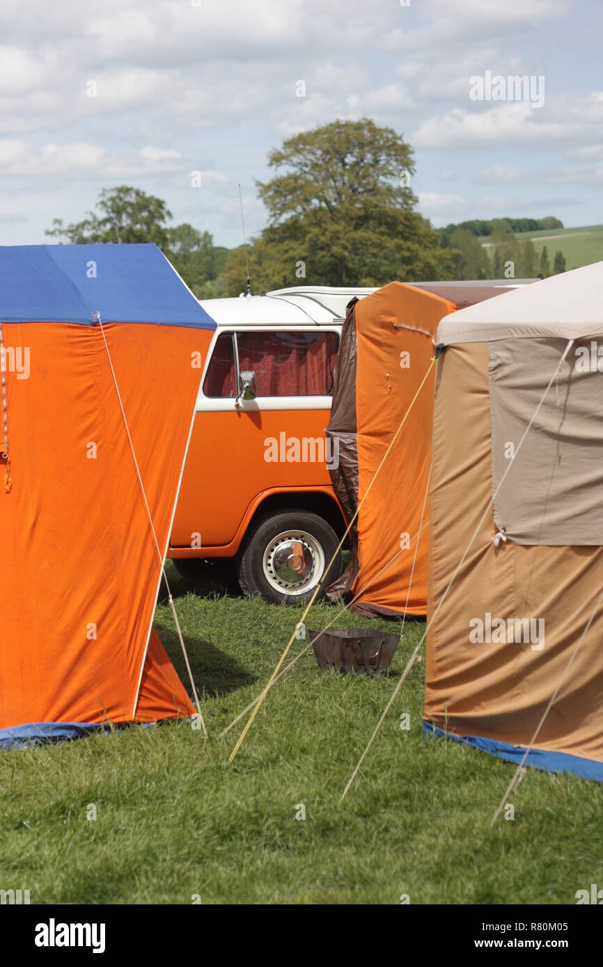 Classic orange cotton awnings at a vintage camping weekend festival Stock Photo