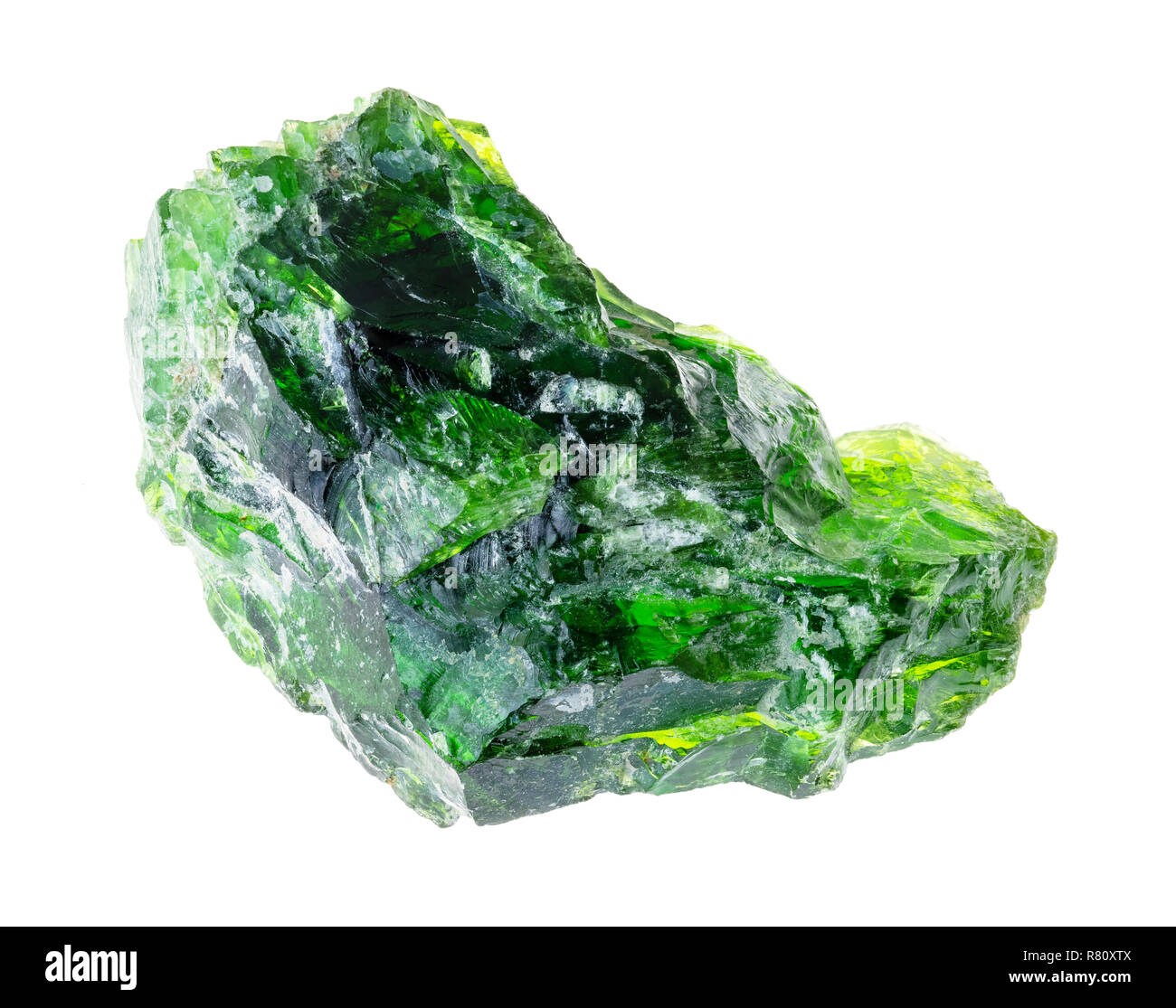 macro photography of natural mineral from geological collection - rough chrome diopside (siberian emerald) crystal on white background Stock Photo