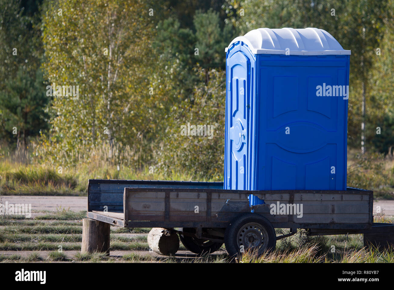 Mobile Toilet Temporary Cabin Toilet On A Trailer In The Woods