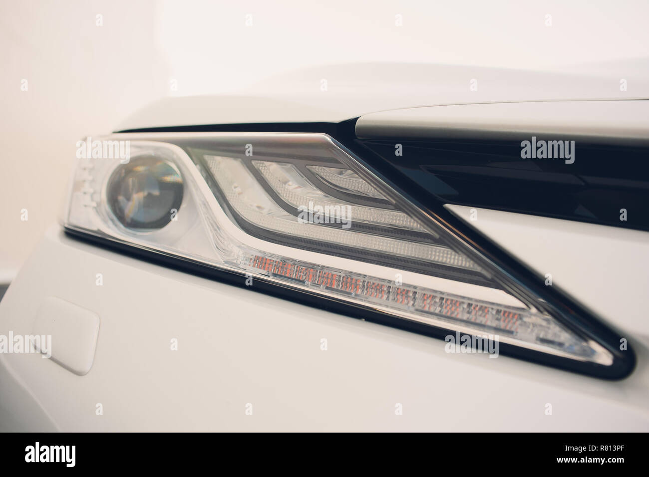 The new car white headlights are beautiful Stock Photo Alamy