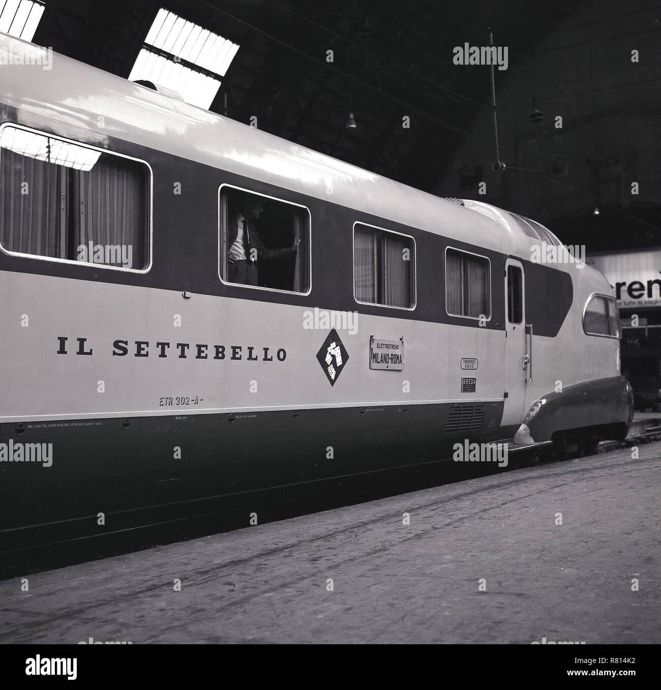 1960, historical, the distinctive Italian train, the'Settebello', on a railway platform at Milan centrale station. Introduced in 1953, this luxury high-speed express train covered the Milano-Roma route and was operated by the Italian State Railways (FS) and featured observation lounges at the front and rear of the the train. Stock Photo