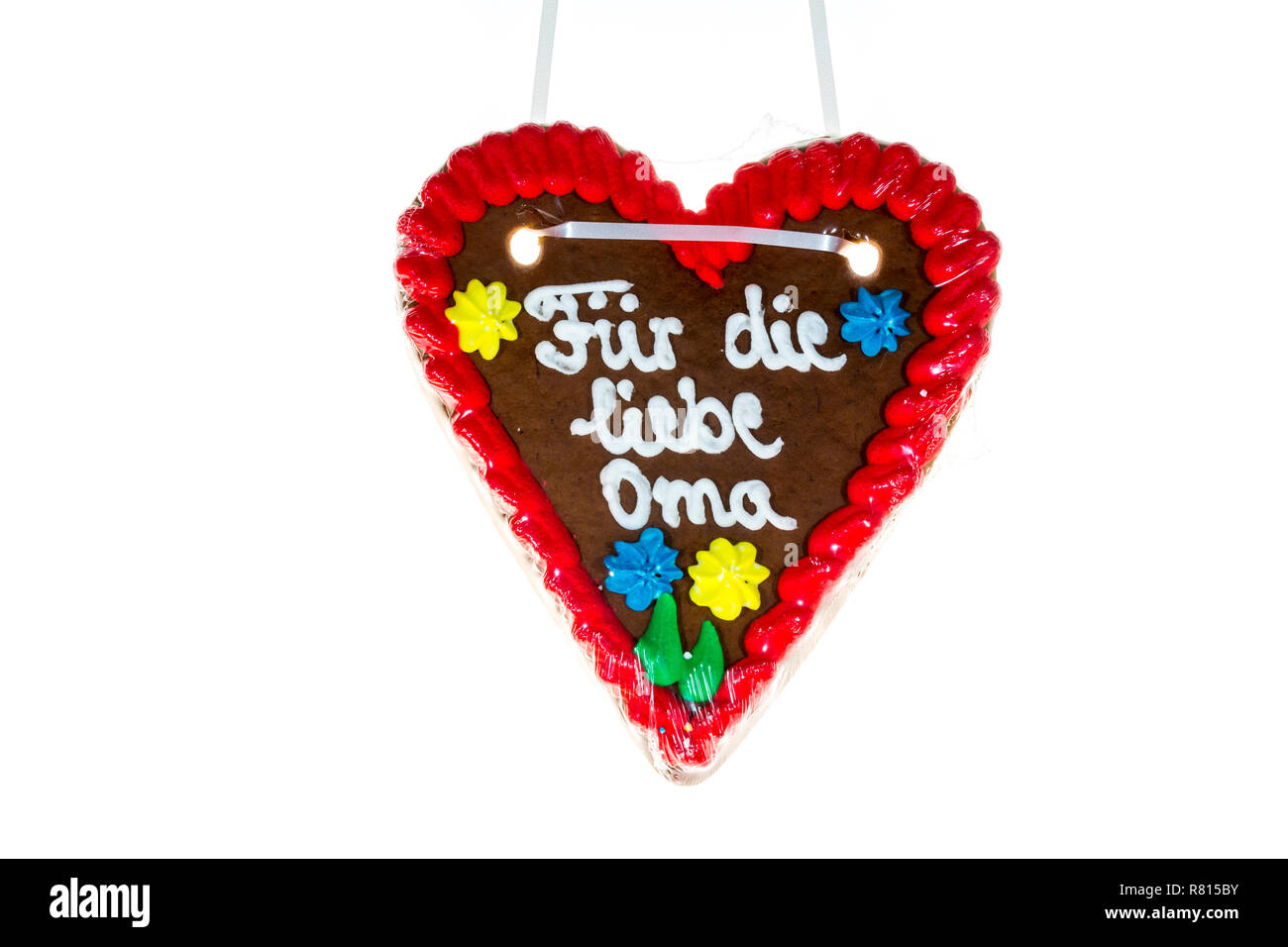 Gingerbread heart with the writing 'Fuer die liebe Oma', German for 'to dear granny' Stock Photo