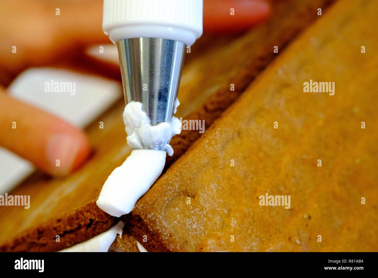 Step-by-step photos of the construction of a gingerbread house Stock Photo