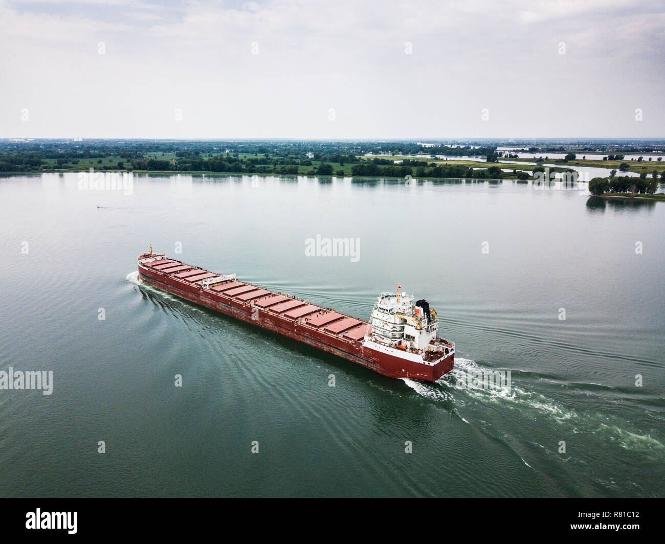 Cargo ship near the Port of Montreal on the St. Lawrence River Stock Photo