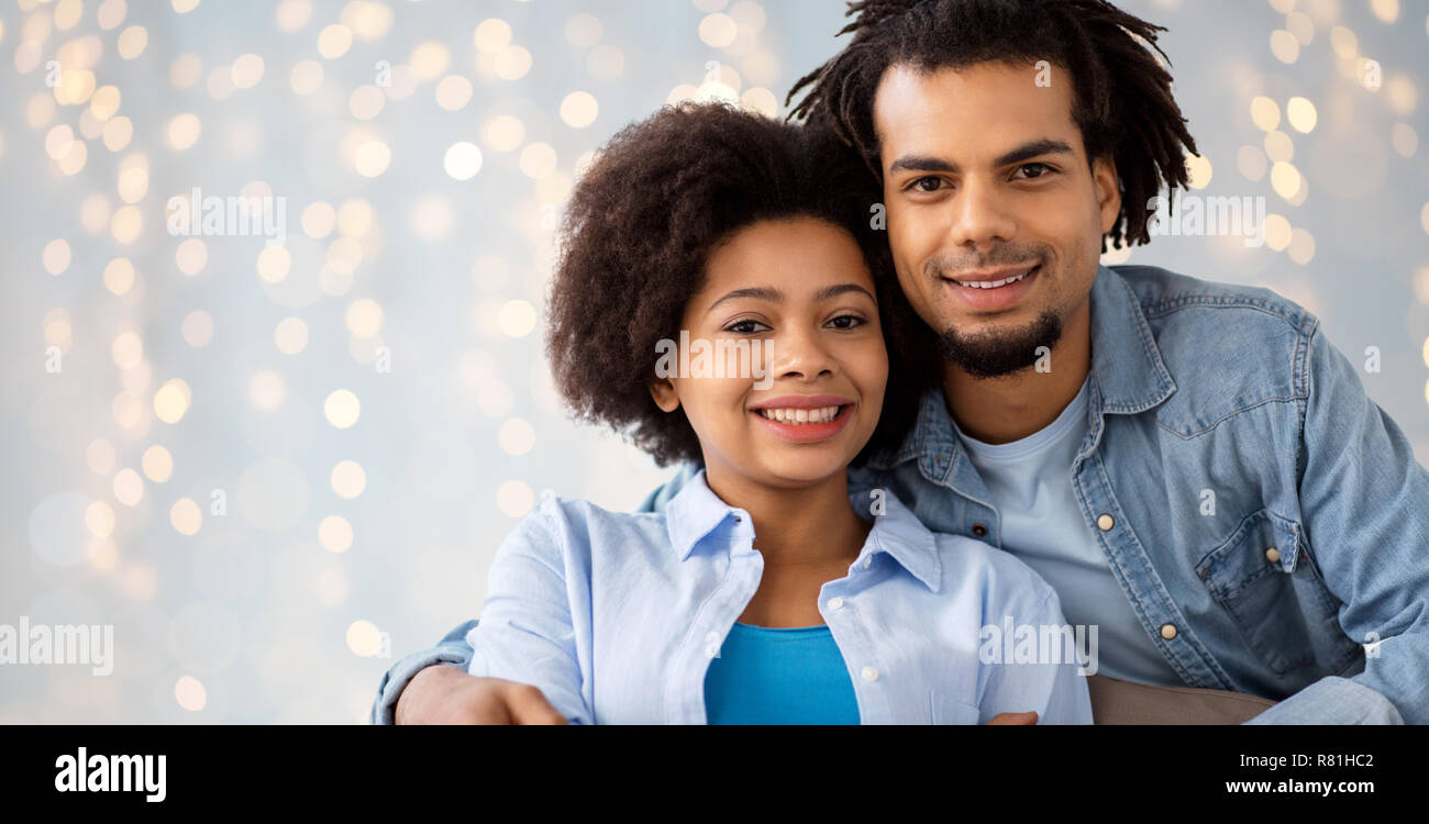 happy african american couple hugging Stock Photo - Alamy