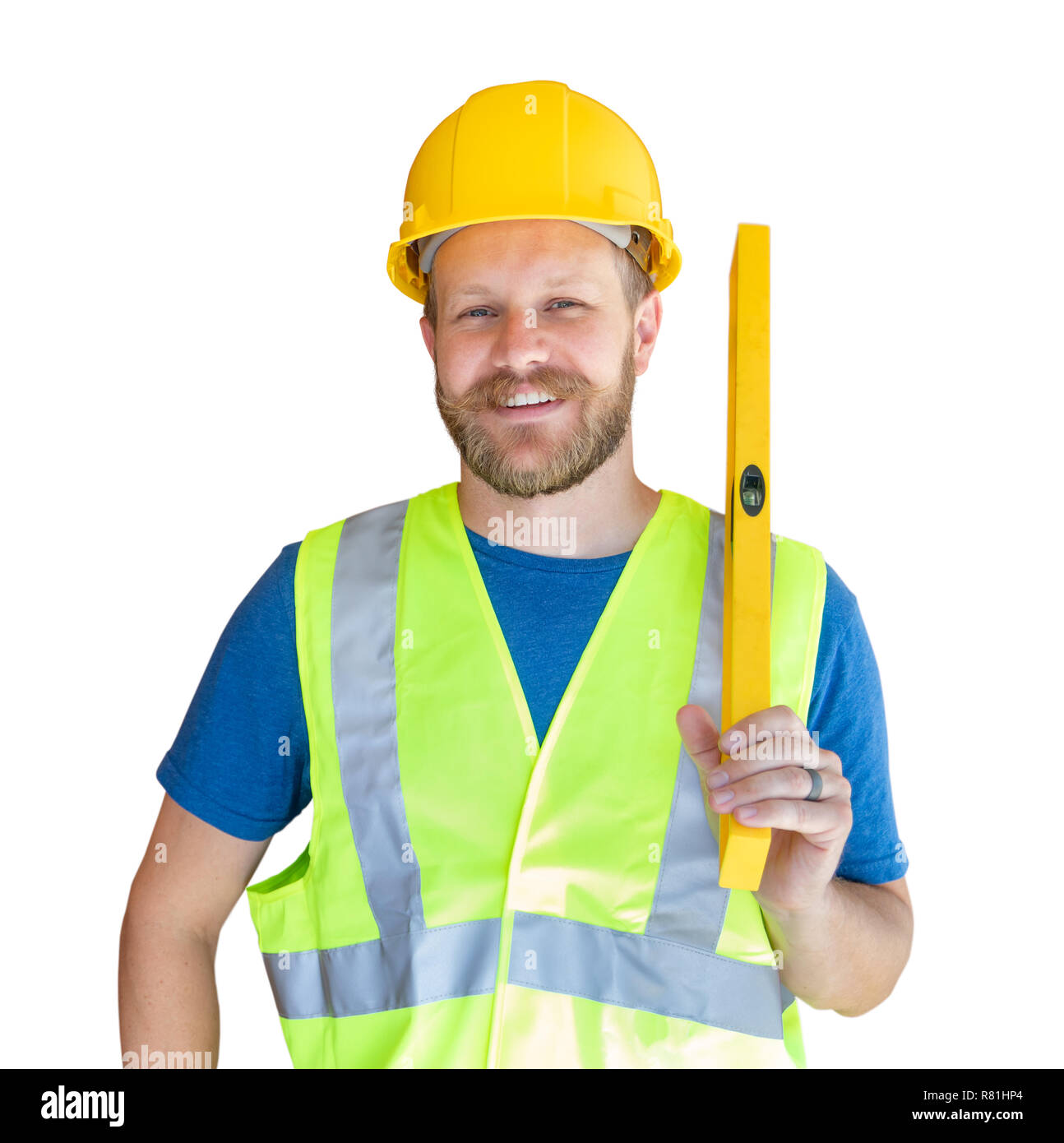 Caucasian Male Contractor With Hard Hat, Level and Safety Vest Isolated. Stock Photo