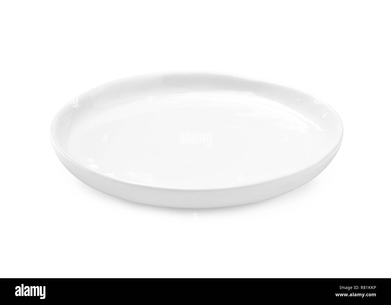 White ceramic plate isolated. Stock Photo