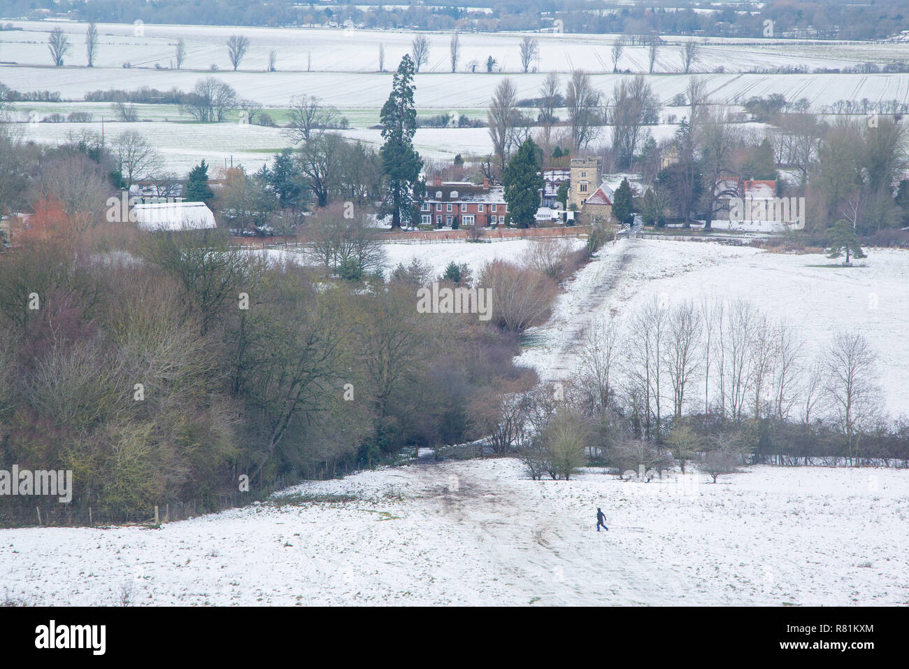 The village of Little Wittenham, Oxfordshire in the winter snow from Round Hill, Wittenham Clumps, Oxfordshire Stock Photo