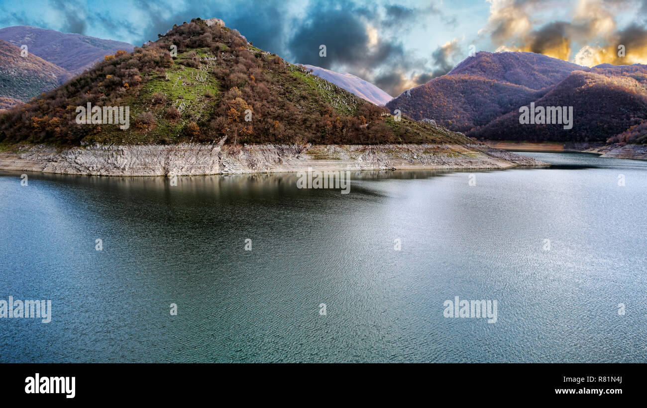 Sunset on the Turano lake and its mountains - Italy Stock Photo - Alamy