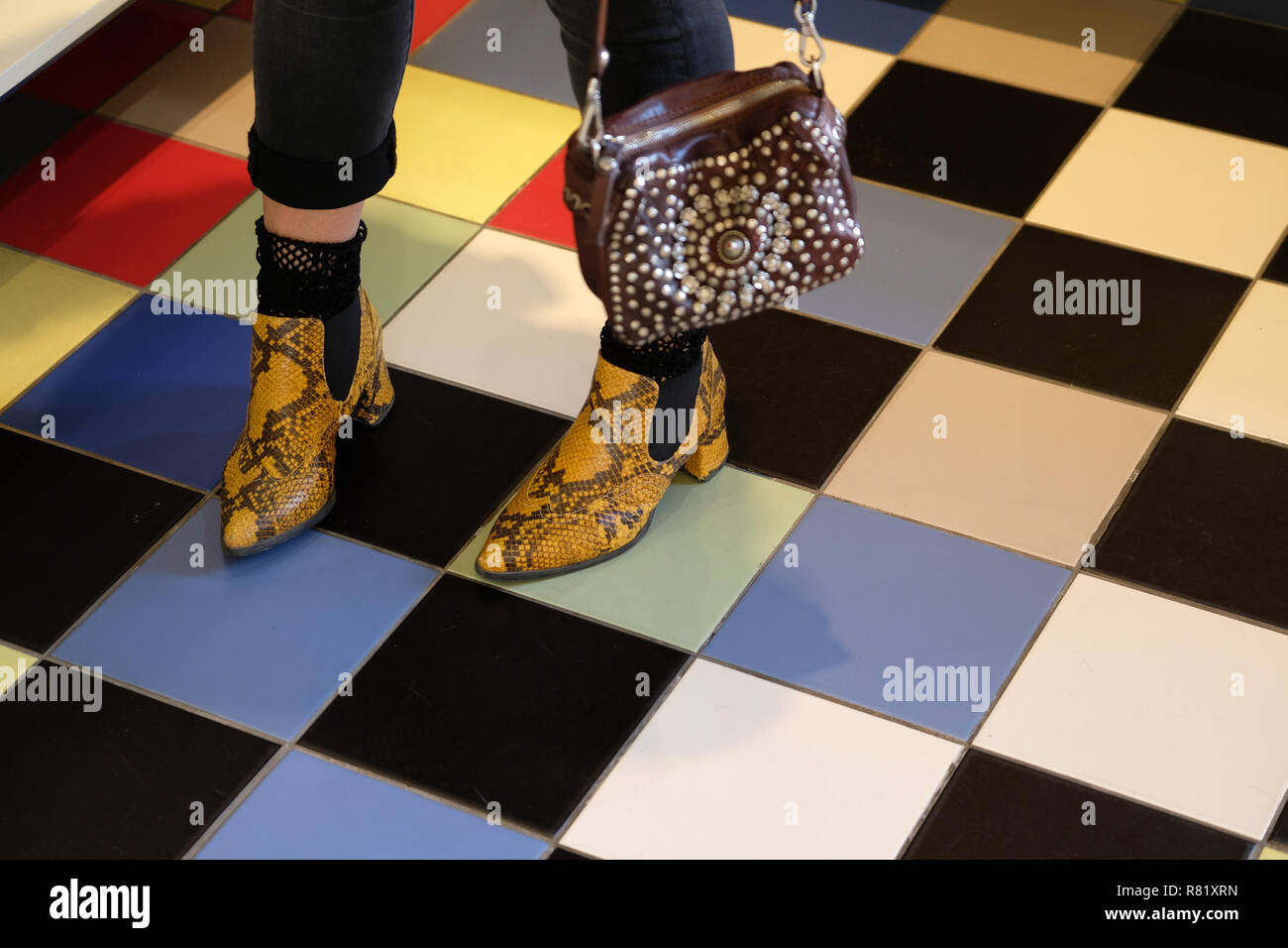 Snake shoes on colorful tiles Stock Photo