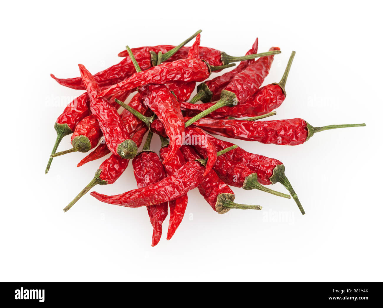 Dry red peppers isolated on white background Stock Photo - Alamy
