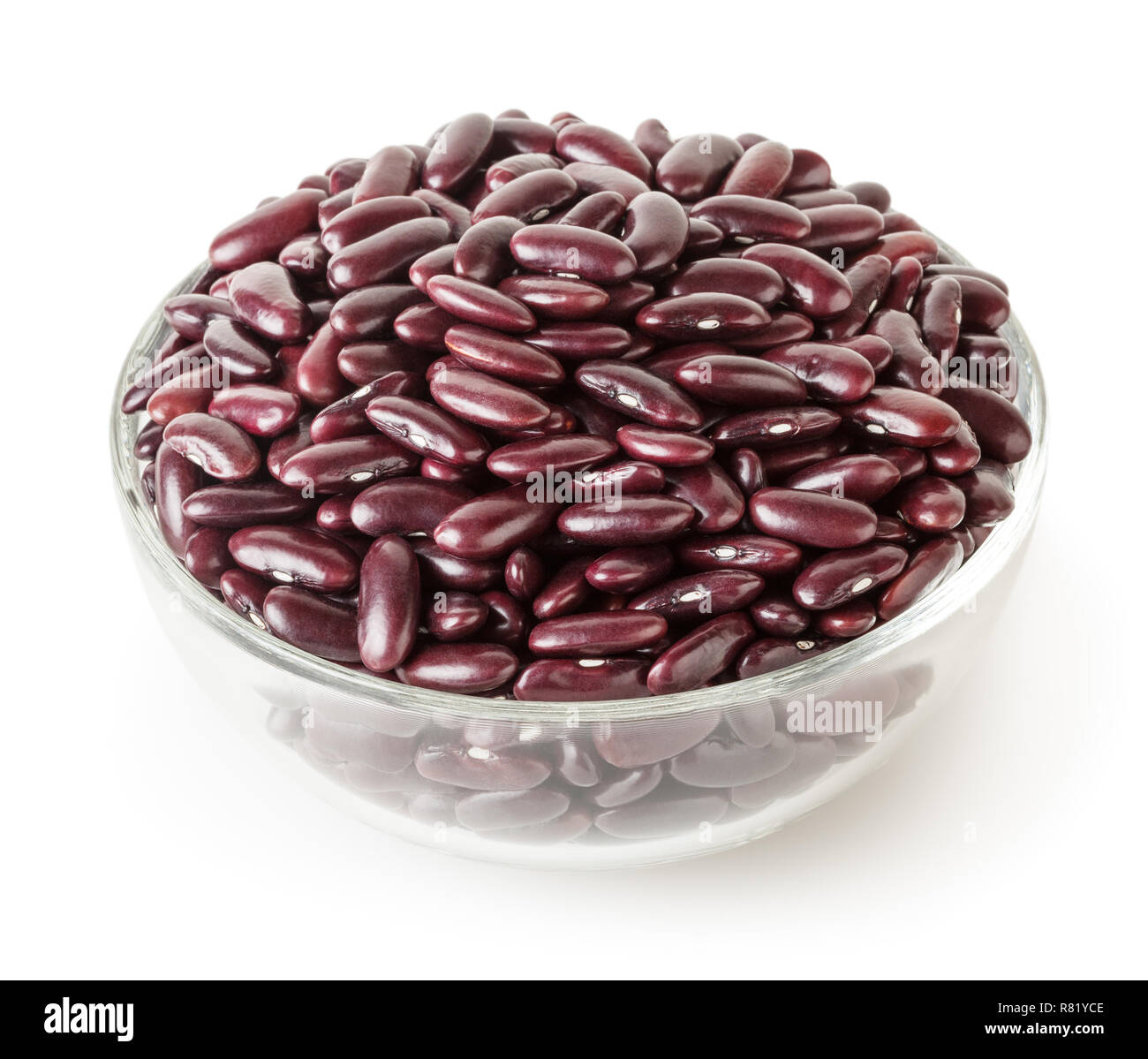 Uncooked red kidney beans in glass bowl isolated on white background