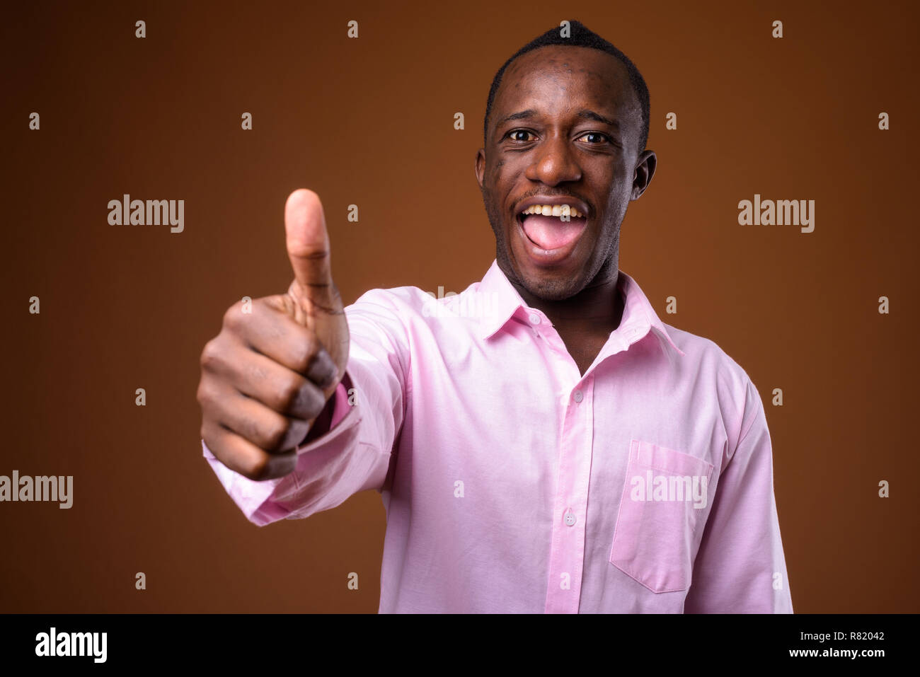 Happy african american smiling hi-res stock photography and images - Alamy